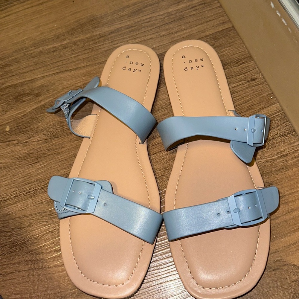 New without tags- target brand sandals. Very cute light blue, soft soles